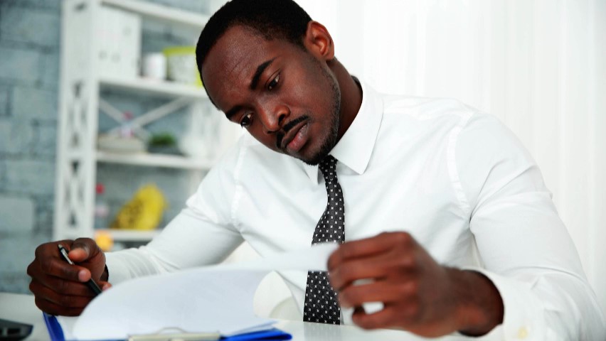 Gentleman reviewing Letters Testamentary 